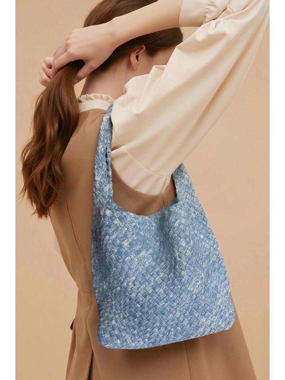 Bohemian Large Bag Features a Distinctive Woven Denim Texture.